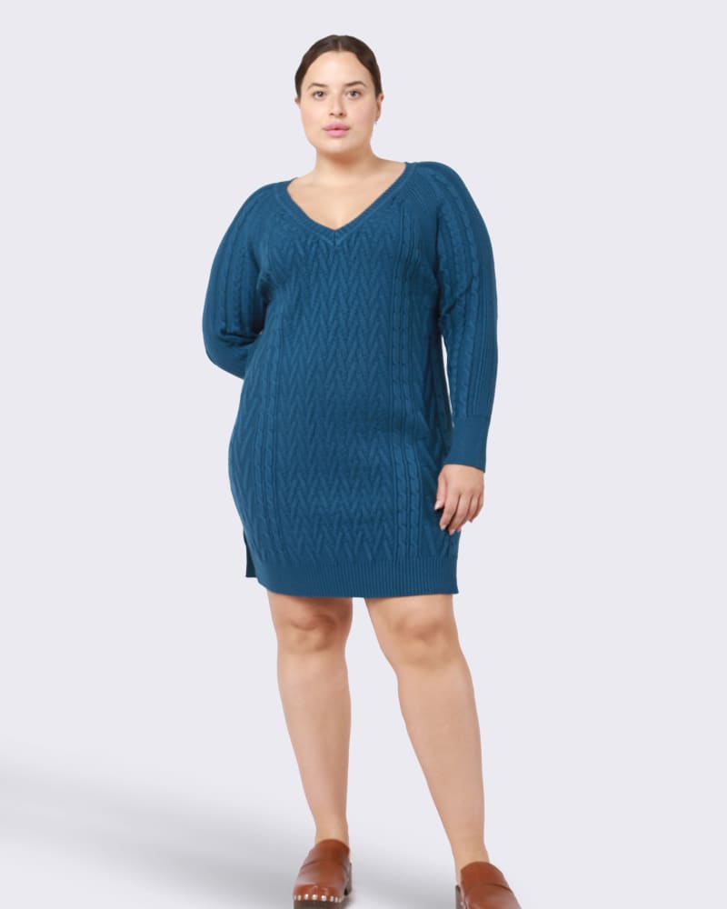Front of a model wearing a size 0X Blair V-Neck Cable Knit Sweater Dress in Teal by DEX PLUS. | dia_product_style_image_id:235507